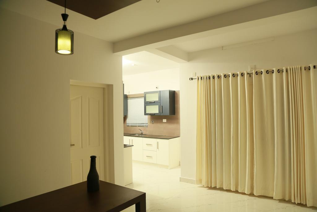 เอสอาร์เอ็ม ทาวเวอร์ เรสซิเดนซี Apartment กูรูวาเยอร์ ภายนอก รูปภาพ