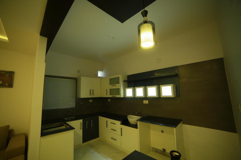 เอสอาร์เอ็ม ทาวเวอร์ เรสซิเดนซี Apartment กูรูวาเยอร์ ภายนอก รูปภาพ
