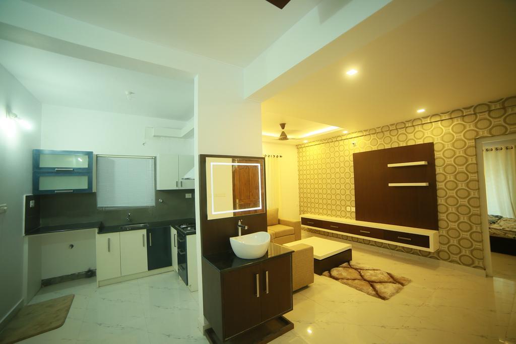 เอสอาร์เอ็ม ทาวเวอร์ เรสซิเดนซี Apartment กูรูวาเยอร์ ภายนอก รูปภาพ