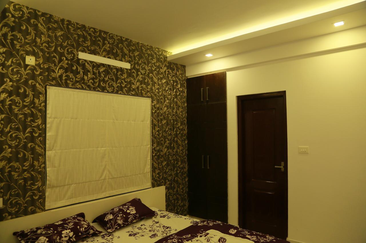 เอสอาร์เอ็ม ทาวเวอร์ เรสซิเดนซี Apartment กูรูวาเยอร์ ภายนอก รูปภาพ