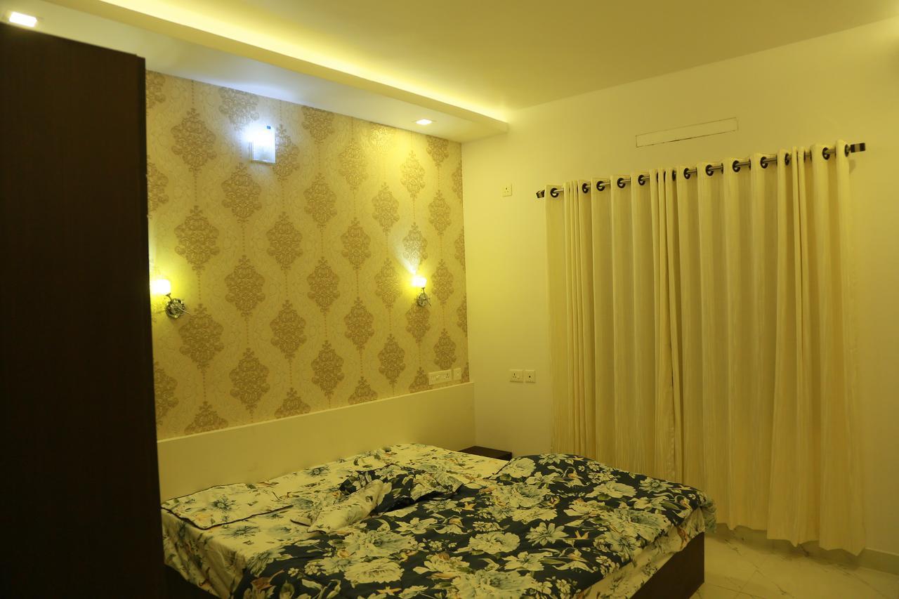 เอสอาร์เอ็ม ทาวเวอร์ เรสซิเดนซี Apartment กูรูวาเยอร์ ภายนอก รูปภาพ